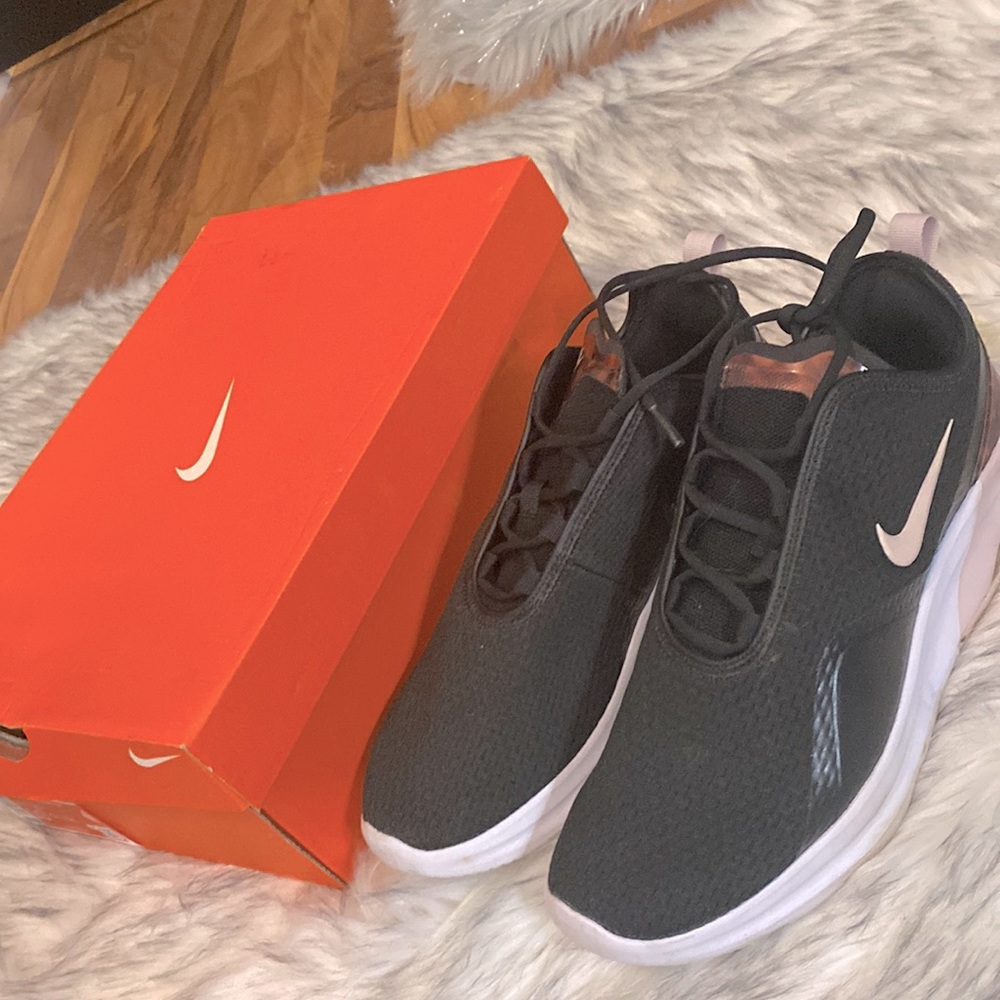 Used Nike Womens Revolution black tennis shoes size 10